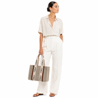 Woman holding Chloé Beige Woody Tote Bag